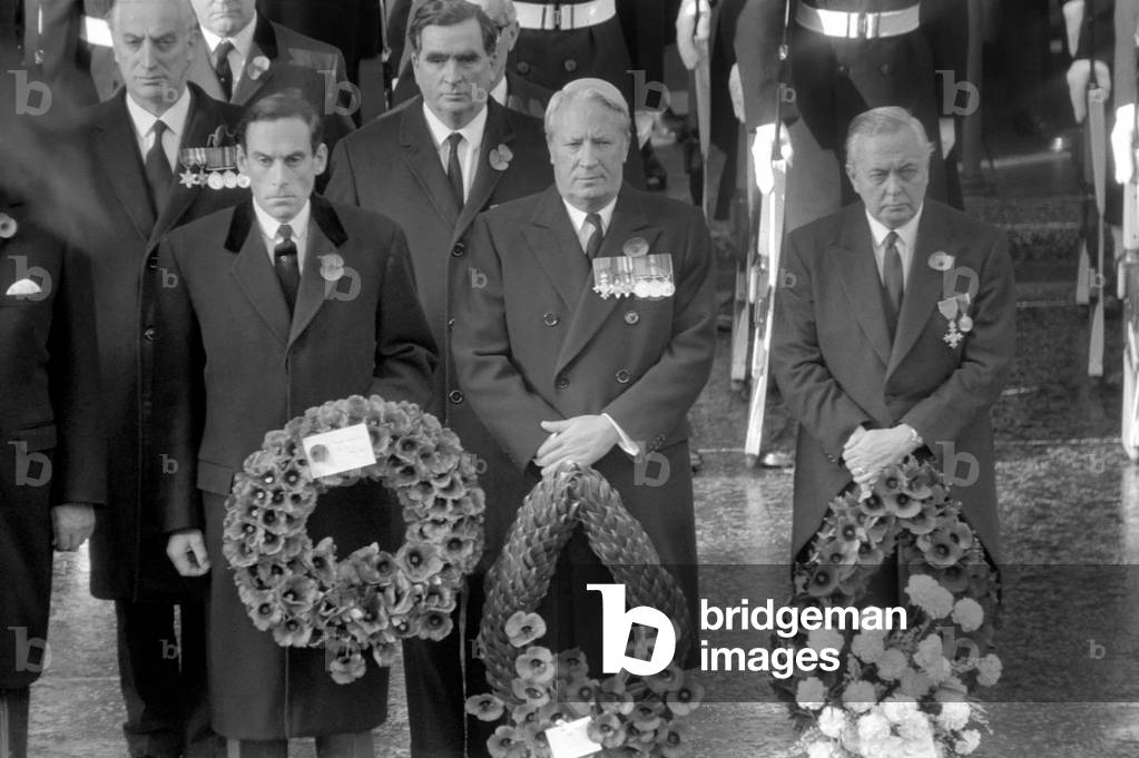 Remembrance Sunday in Whitehall. At the end of this year's two minutes silence demonstrators shouted remember Biafra. They were quickly taken away by the police. This all took place only 50ft. from where the Queen was standing near the Cenotaph. 
Liberal Party leader Mr. Jeremy Thorp, with Edward Heath and Prime Minister Harold Wilson standing by the Cenotaph this morning. 
November 1969