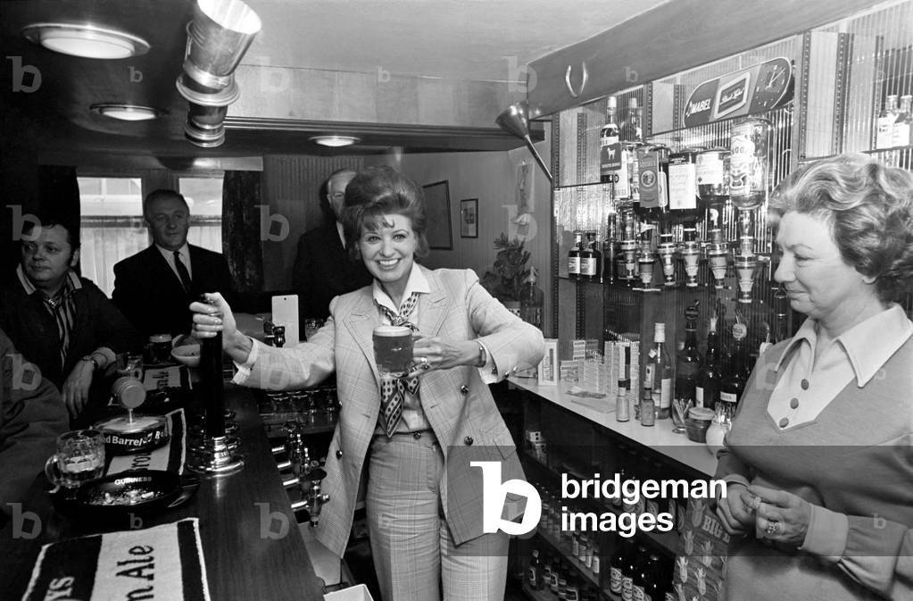 Entertainment. Television: Pat Phoenix of Coronation Street, is the new licencee of the Navigation hotel at Buxworth in Derbyshire. Pat behind the bar, pulling a pint. In the pub with Joan Francis (Dot Greenhalgh of the street) who is to help in running the pub. 
December 1969