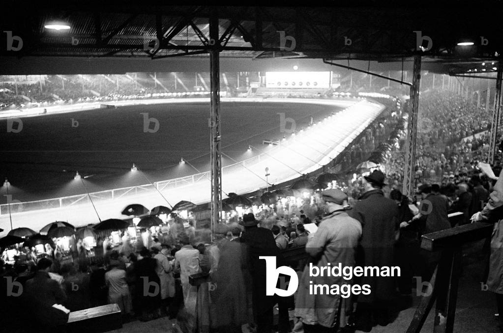 A night at the dogs, general views of the track and characters that work at the White City Greyhound Track. 7th September 1946 (b/w photo)