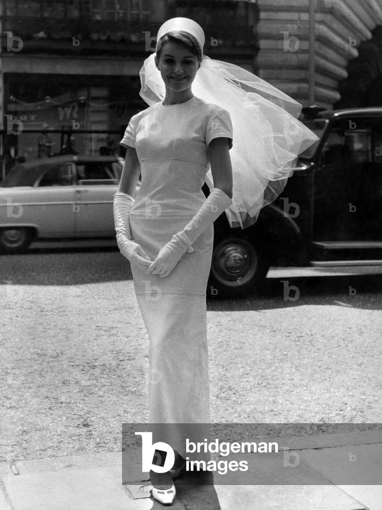 Bride' in gown of Leather: What did the bride wear? The inevitable question got a surprising answer at a fashion show in London yesterday (8-5-62). The 
