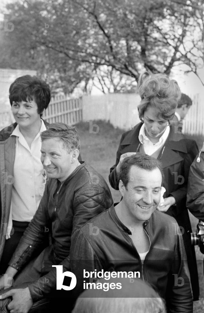 Sport Motorcycling: Isle of Man TT Racing 750 CC Sidecar Class. Siegfried Schauzu celebrates victory with his crew, June 1969