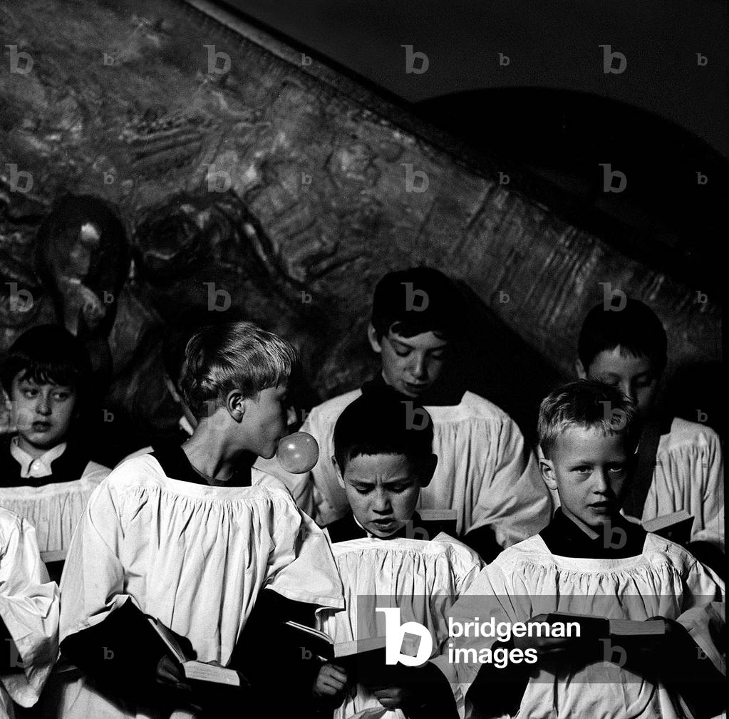 Choir boy with bubble gum, 1969 (b/w photo)