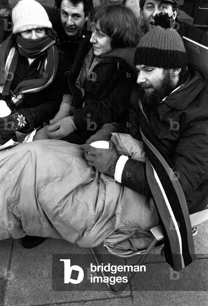 Elton John fans spent the night in sub-zero temperatures to make sure of getting tickets for the superstars concerts at Newcastle City Hall. 40 campers had taken their places on the steps in advances of Elton's March 22nd and 23rd gigs. 2nd February, 1979 (b/w photo)