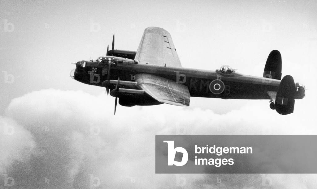 The last serving Royal Air Force Avro Lancaster bomber makes its first flight since being grounded two years ago for a major overhaul. Pictured in flight at Staverton Air Show, it will make its annual visit to the RAFA Air Display at Baginton Airport, Coventry. May 1979 (b/w photo)