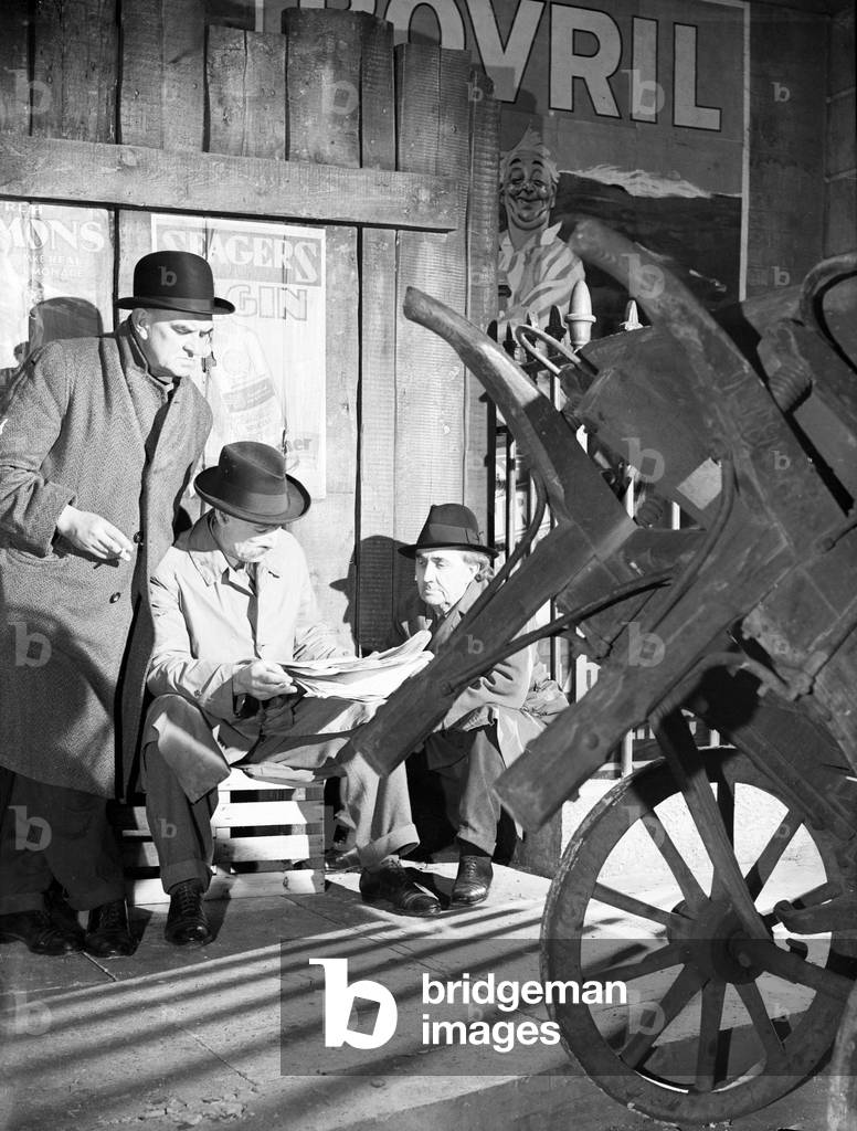 Filming of Pygmalion, directed by Anthony Asquith and Leslie Howard, at at Pinewood Studios, London, England, 20th March 1938. Miriam Martin, who served with Vic MacLaglen in the 1st Life Guards, Philip Knox and D. Alden Cleaser.