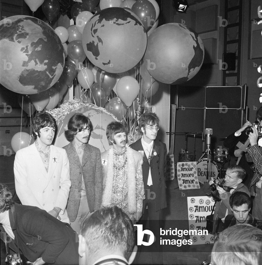 Press call for Our World, the first live global television link. Broadcast to 26 countries and watched by 400 million, the programme was broadcast via satellite on June 25, 1967. The BBC had commissioned the Beatles to write a song for the UK's contribution. 'All You Need Is Love' a song written by John Lennon and credited to Lennon/McCartney was first performed by The Beatles at this event & released as a single the following month. Pictured at Abbey Road Studios 24th June 1967 (b/w photo)
