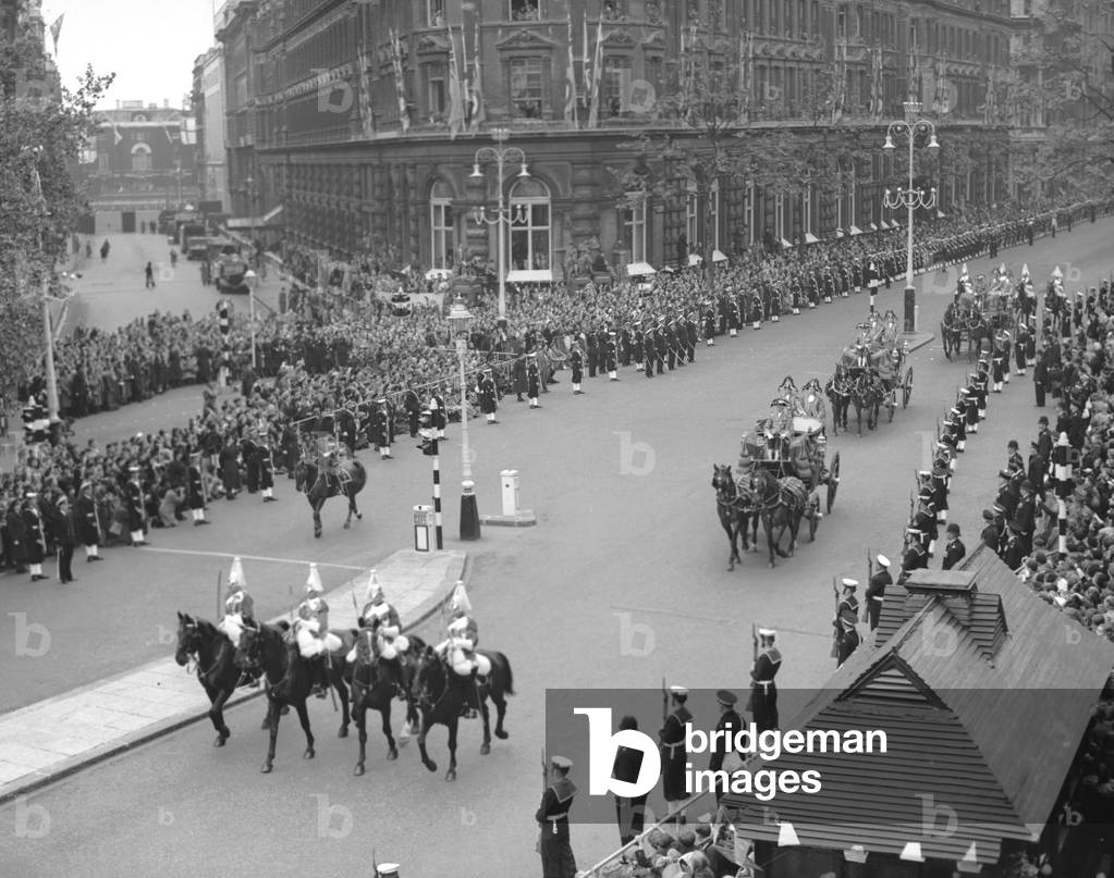 The Carriage Procession of Princes and Princesses of the Blood Royal escorted by the NCO's of the Household Cavalry along Northumberland Avenue to Westminster Abbey for the Coronation of Queen Elizabeth 2nd June 1953 (b/w photo)