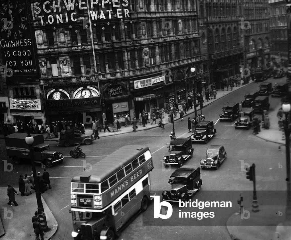 Piccadilly Circus London at the end of World War 2, the day before VE Day, 7th May 1945 (b/w photo)