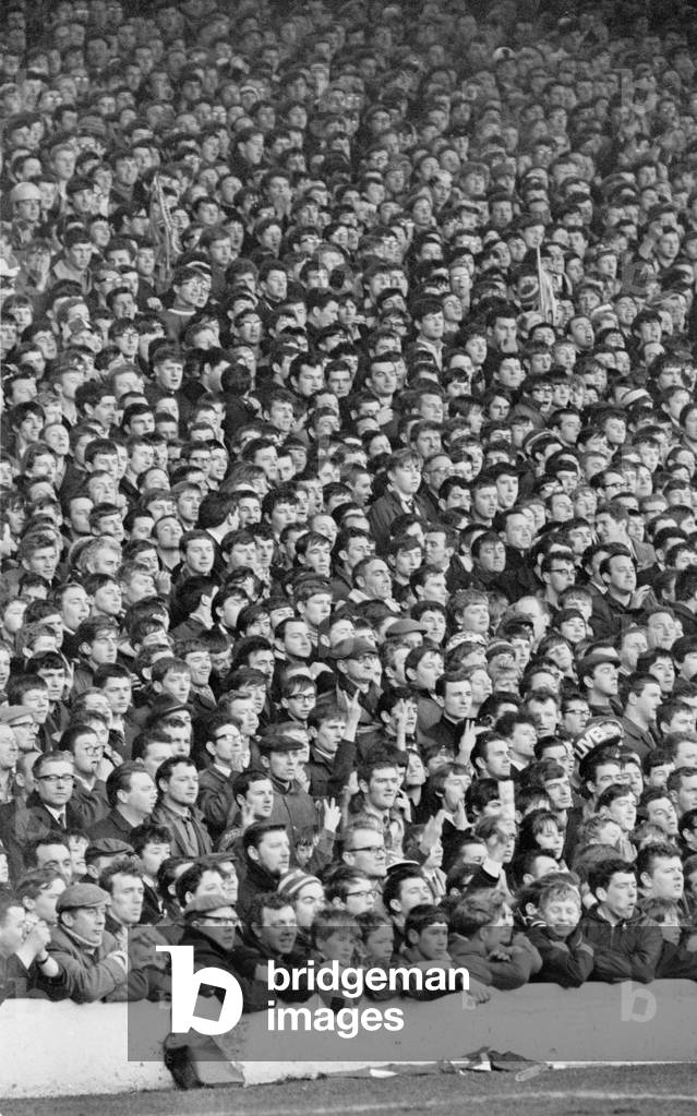 Liverpool supporter during the match against Stoke at Anfield. Liverpool went on to win the match two one 4th March 1967 (photo)