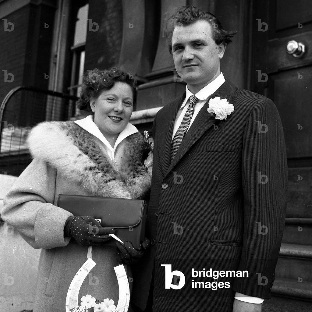 Youth Culture 
Teddy boy Tony Reuter leader of the Elephant Boys gang, seen here with his bride on their wedding day
1955