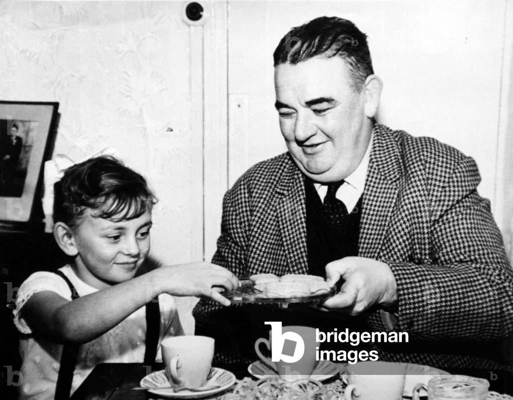 Policeman Victor Jones and schoolgirl Susan Mayband following Aberfan disaster, December 1966