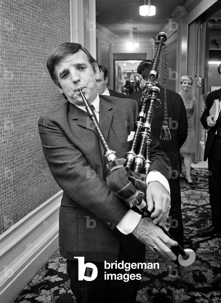 Radio DJ Alan Freeman playing the bagpipes 
22nd August 1966