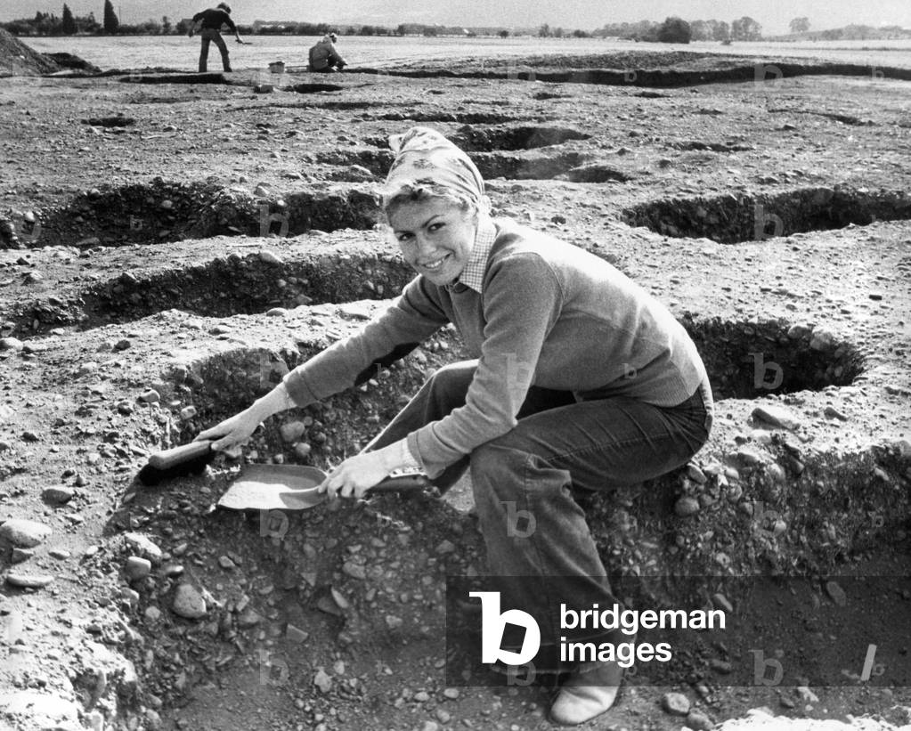 Archaeology student Rosie Barnes at work on the Bronze Age site near Milfield. A woman with a dust pan and brush, things never change.