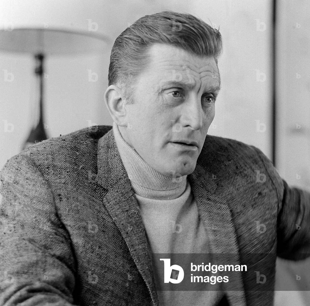 Kirk Douglas at the Dorchester Hotel, London, March 1965 (b/w photo)