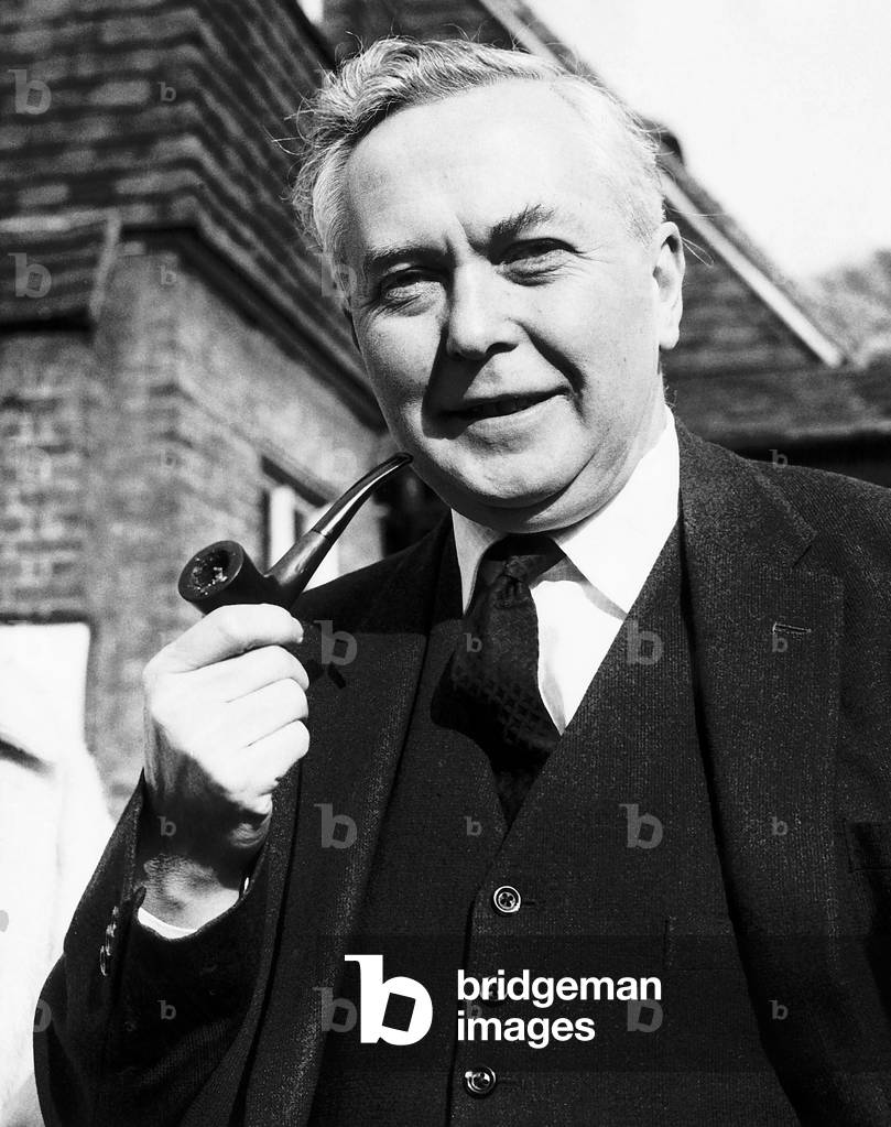 Harold Wilson MP smoking his pipe 1964