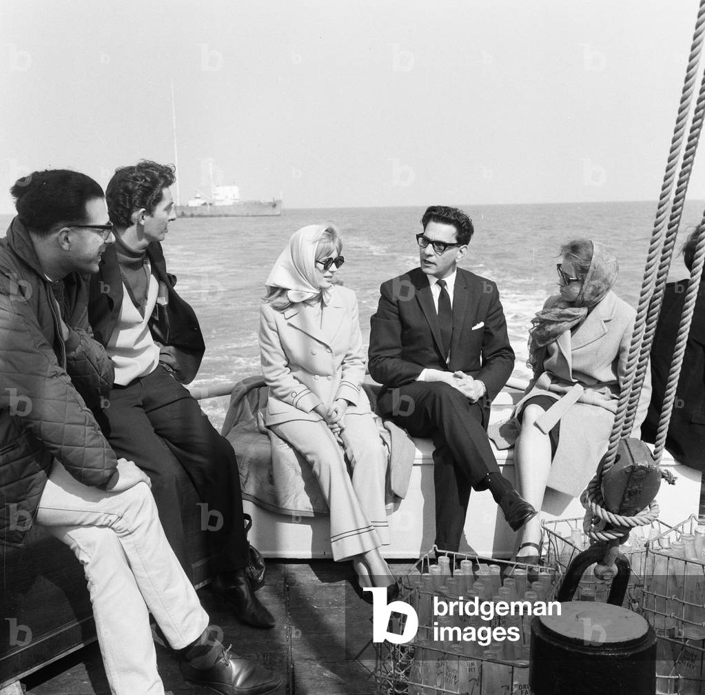 Marianne Faithfull pictured with members of Radio London pictured on the Pirate Radio Ship. 8th May 1965 (b/w photo)
