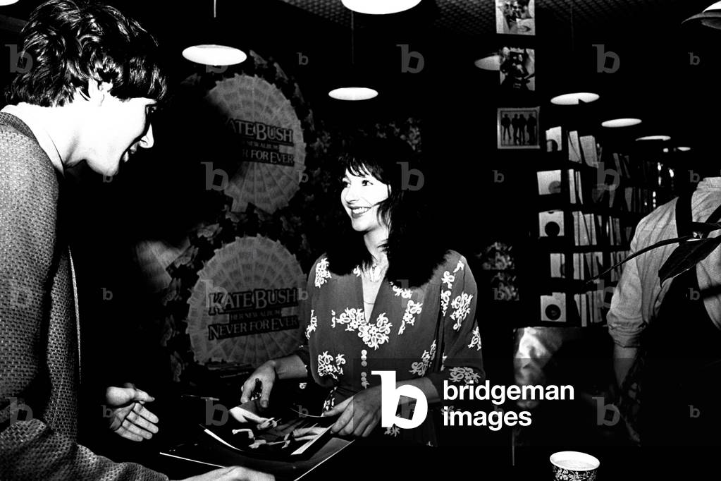 Singer Kate Bush at Virgin Records in Eldon Square, Newcastle signing autographs on the 10th September 1980 (b/w photo)