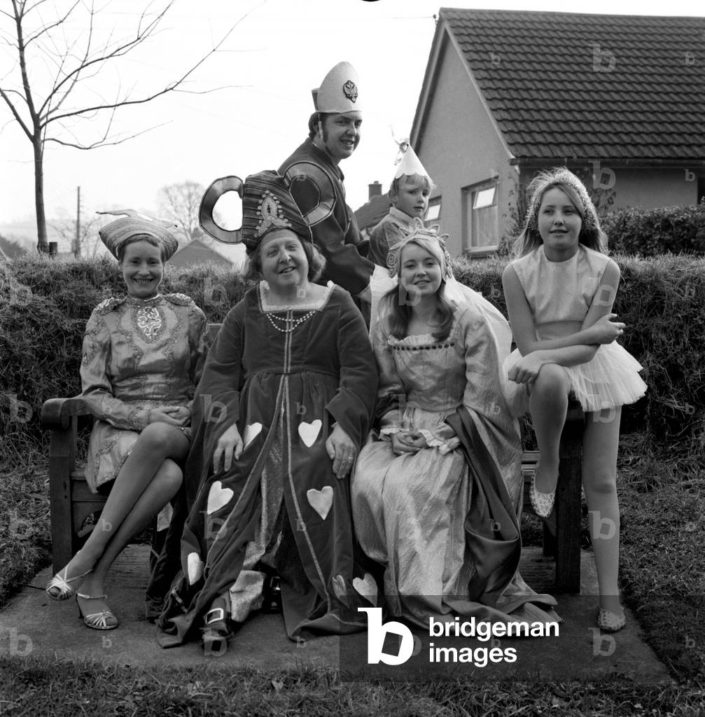 Panto Dame the Queen of Hearts is the Vicar Rev. Brian Berry, his shapely wife Jillian is Dick the Principal boy, and four of the family of five take part in the seasonal pantomime. The Queen of Hearts which is having ten performances at Colaton Raleigh, Devon, the christening place of Raleigh and neighbouring villages. His supporting cast consists of 35 villagers who have made and painted 13 scenes, arranged lighting etc, all. 
 January 1969