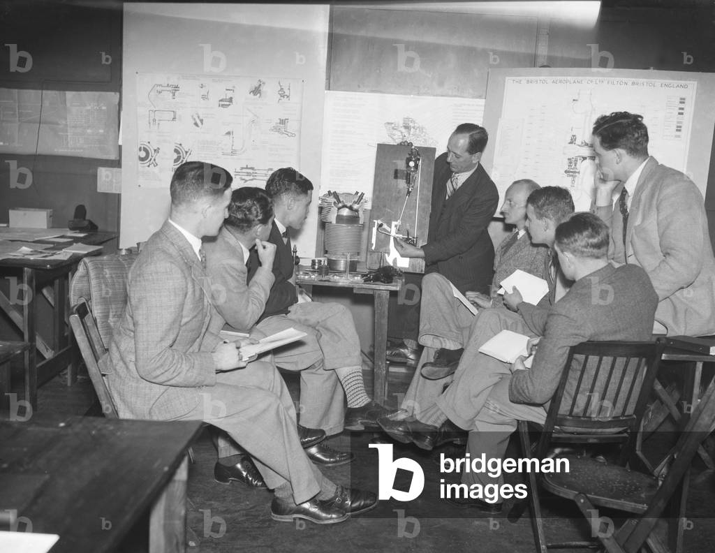 Commercial pilots seen here returning to flight school at Croydon Airport to study engineering, 15th December 1937 (b/w photo)