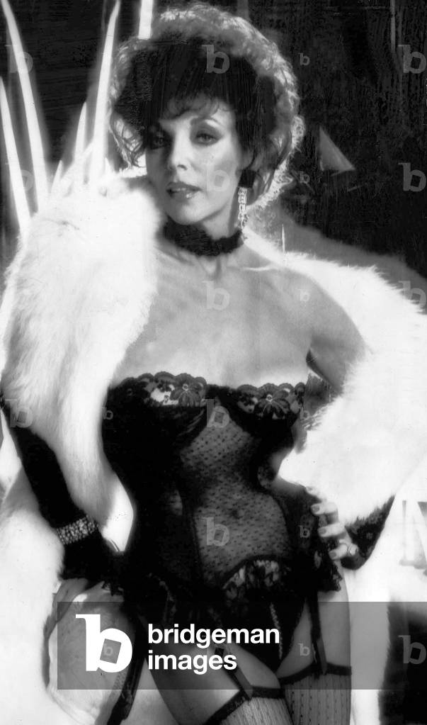 Joan Collins the actress posing for playboy magazine in March 1984.