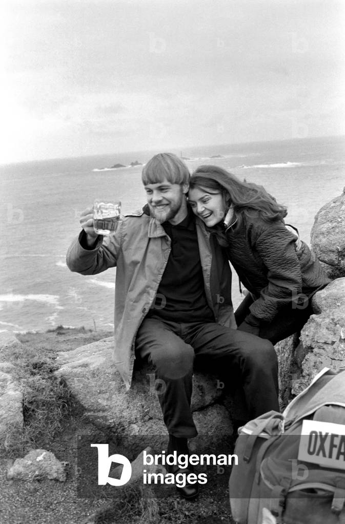 Legless Norman Croucher 29 walked on artificial legs from John o' Groats nearly 900 miles to finish at Land's End pushing his trolley containing the gear he needed during the marathon walk.December 1969