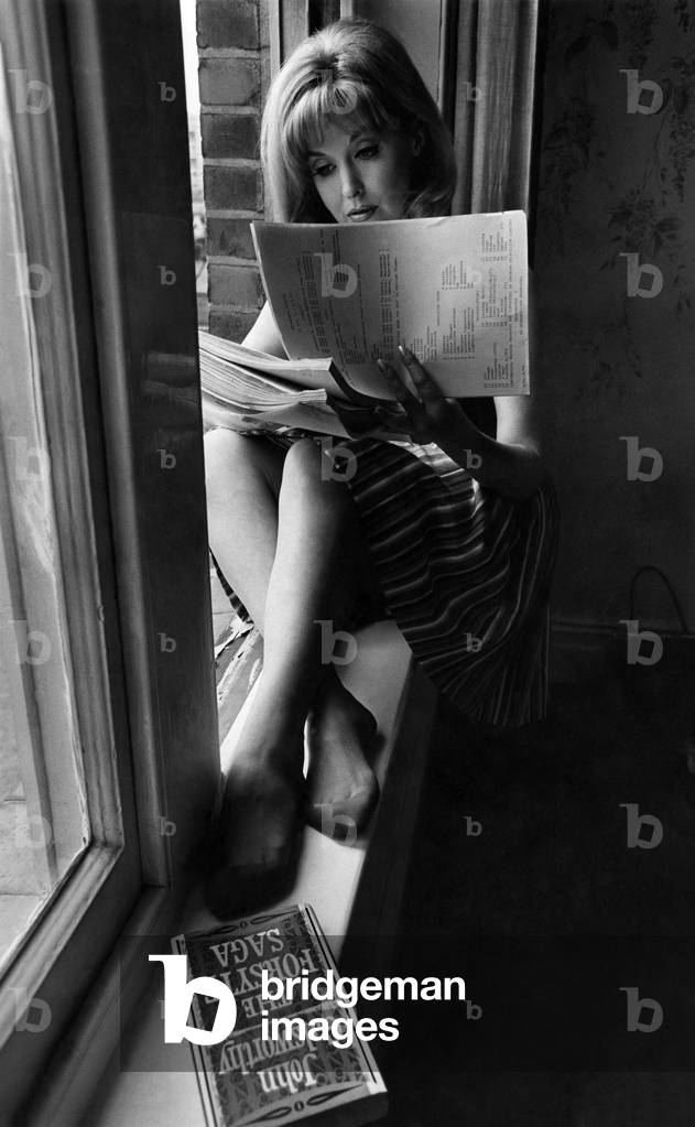 Miss Dawn Nyree Porter... tackling the script for a 26-part series. April 1966