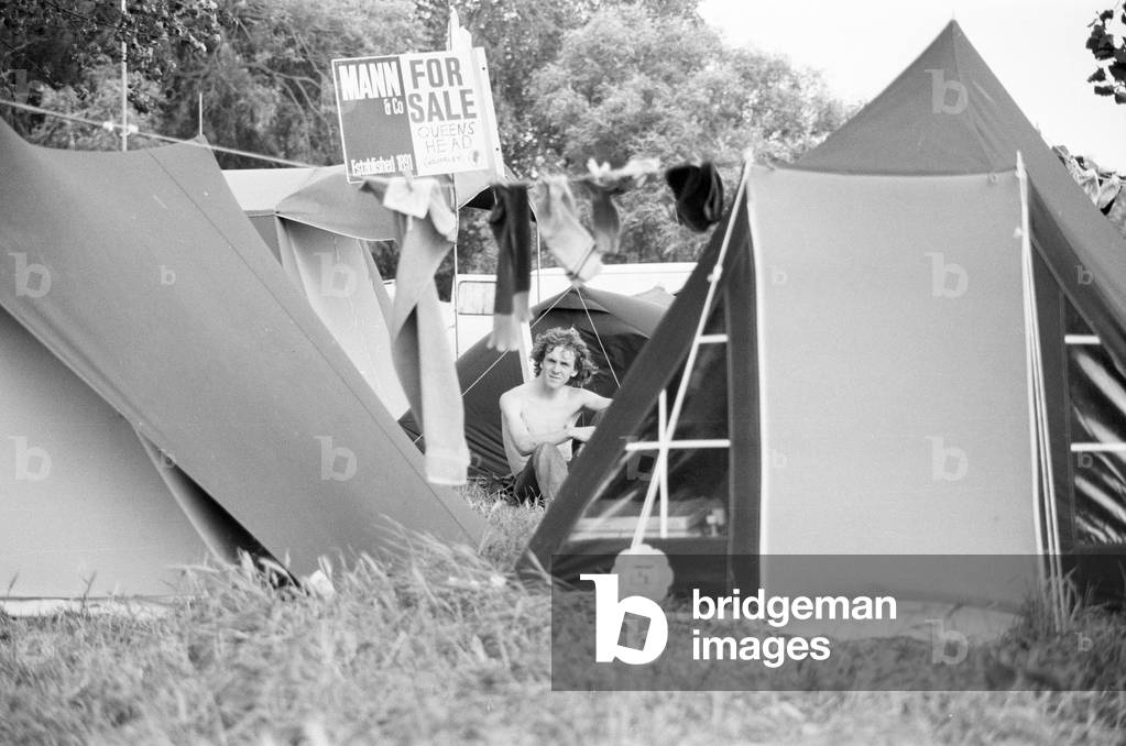 Campsite grows as festival goers start to arrive for the 20th National Rock Festival, taking place 22nd to 24th August, at Richfield Avenue, Reading, August 1980.