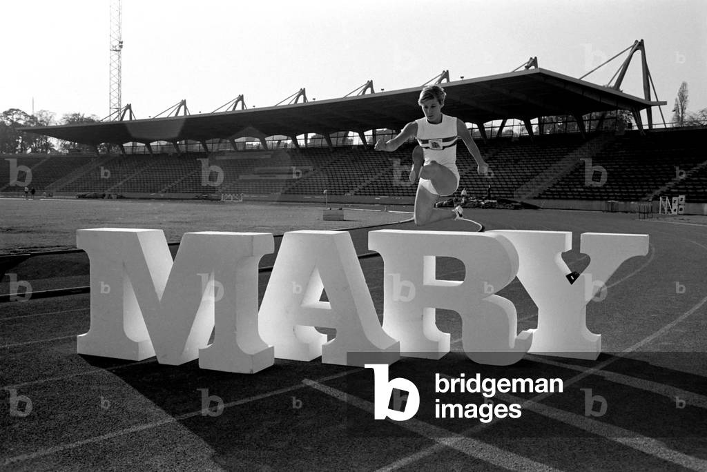 British runner Mary Rand poses during a photoshoot on the race track, December 1969