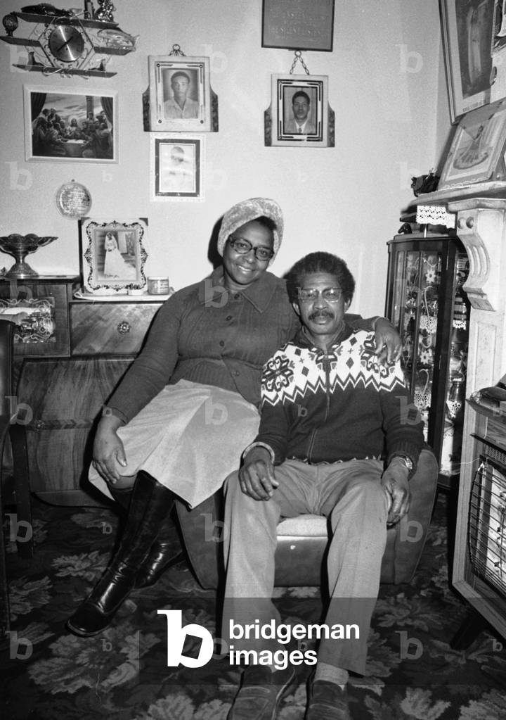 Charles & Ruby Hinds, parents of Dave Hinds from Reggae group Steel Pulse, pictured at home in Handsworth, Birmingham, 22nd February 1978 (b/w photo)