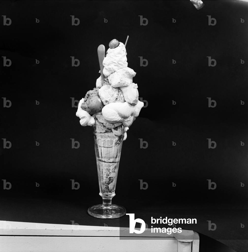 This is a Knickerbocker Glory which will cost you £2, 25p. You don't eat it, of course, at that price. It's made of plastic and you just keep it as an ornament, like some would keep the best silver on the side board. It's the kind of object d'art which is selling well in London's Shepherd Market in the current craze for that groovy vulgarity called kitsch, March 1972 72-2065 (b/w photo)