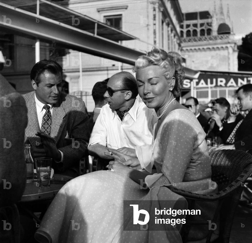 Cannes Film Festival 1953. Right Lex Barker with Donald Zec and actress Lana Turner. April 1953 D2033-001
