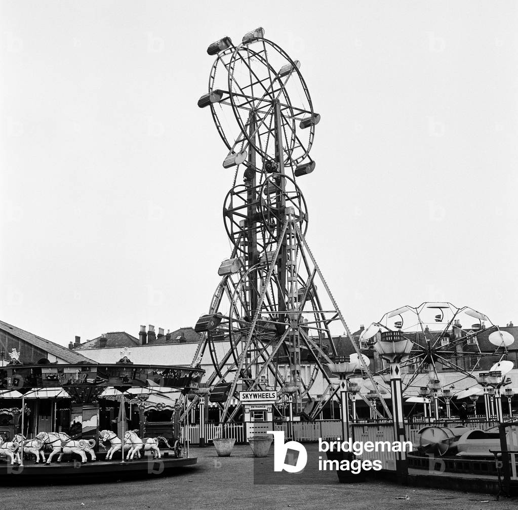 An empty funfair in Margate, Kent, during Good Friday. 27th March 1964 (b/w photo)