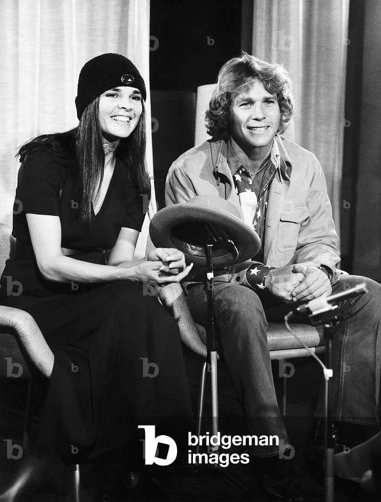 Ryan O'Neal in London with Ali Macgraw for the new film Love Story, March 1971 (b/w photo)