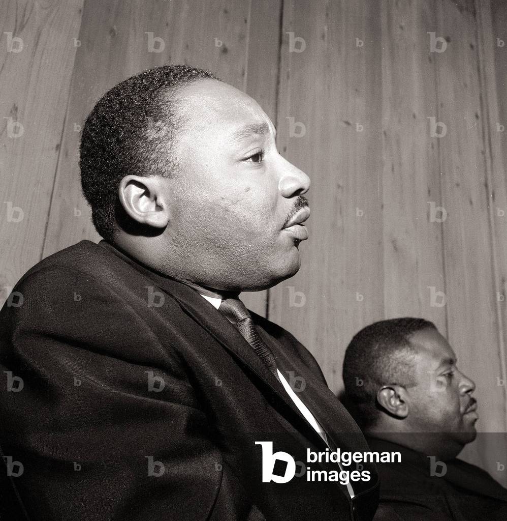 Martin Luther King seen here giving a press conference at the Savoy Hotel, November 1964 (b/w photo)