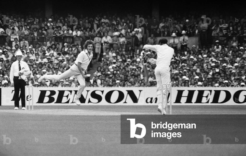 Centenary Test match between Australia and England at The MCG Cricket Ground, Melbourne, Australia.
Bob Willis bowling for England.
12th March 1977.