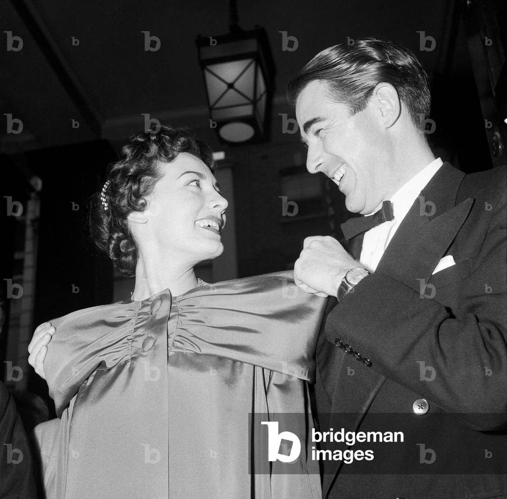Anne Rogers with her husband Michael Hall. Anne Rogers was born in Liverpool, and is an English actress, dancer, and singer. 30th April 1958 (b/w photo)