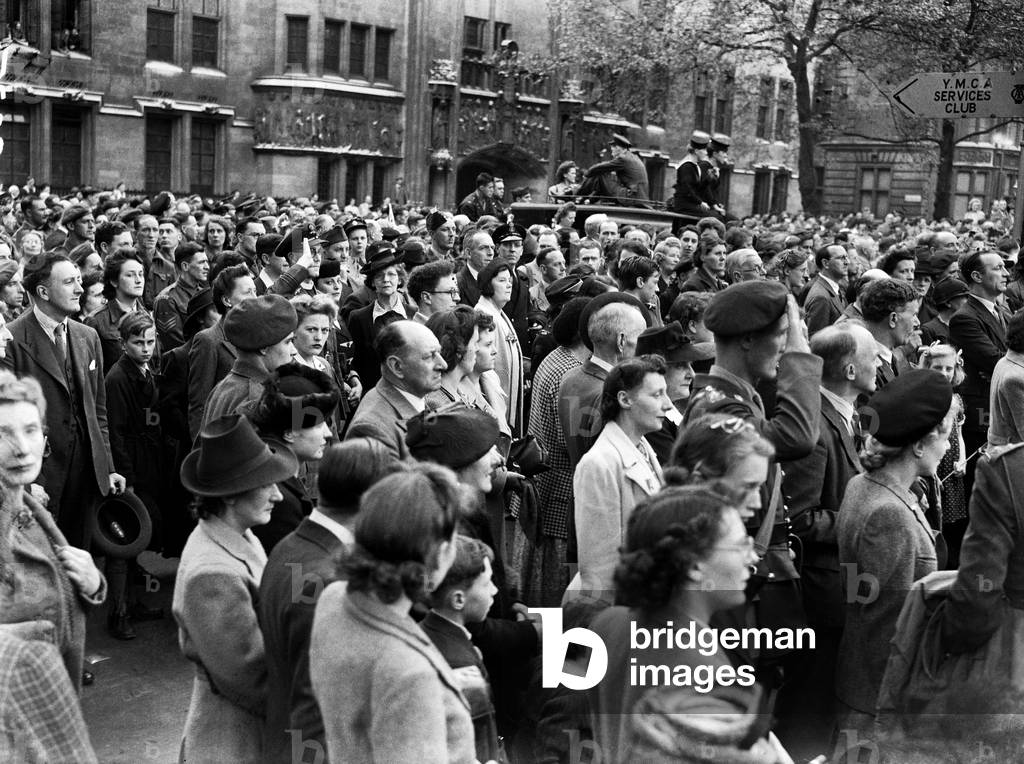 VE Day celebrations in London at the end of the Second World War. Some of the huge crowd gathered in Westminster for the celebrations., 8th May 1945 (b/w photo)