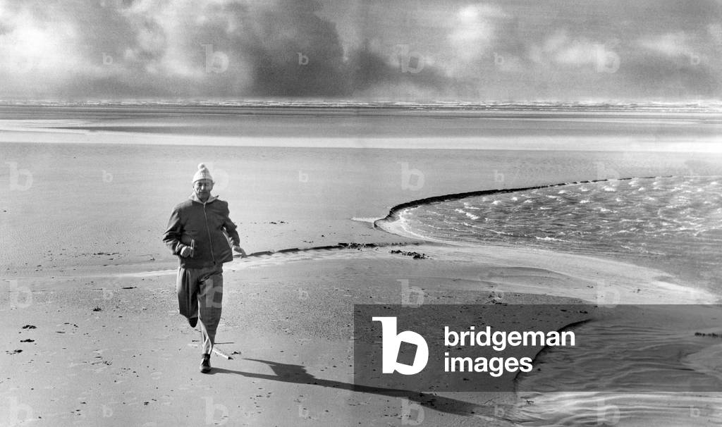 Stanley Matthews seen here training on an expanse of Blackpool Beach, October 1961 (photo)