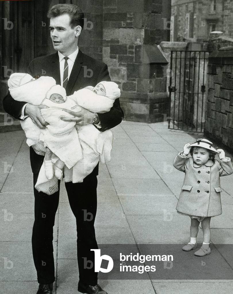 James Smith father of triplets, James Smith Jeremiah Smith and David Smith with sister Louise Smith 1963 (b/w photo)