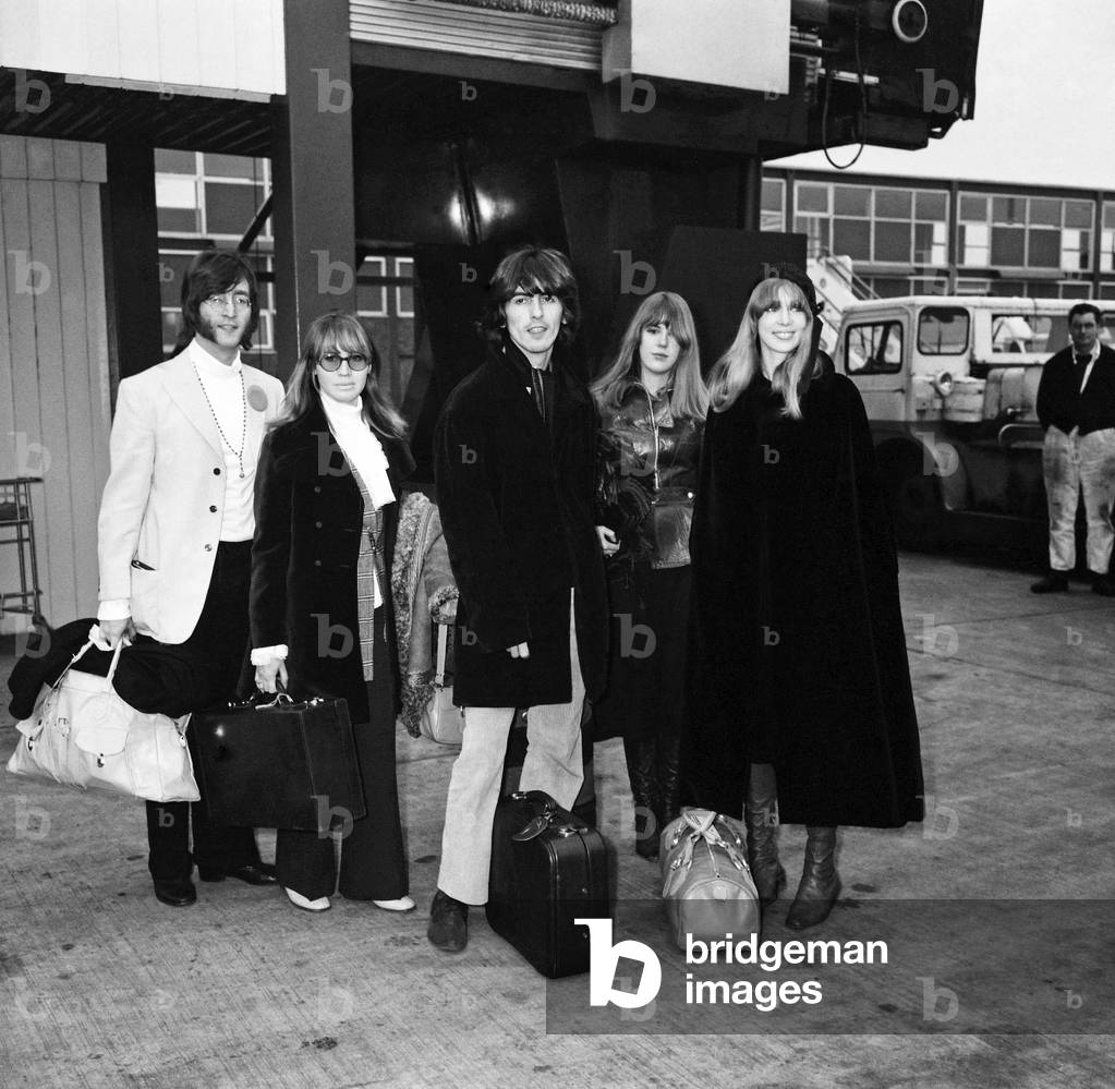 John Lennon and wife Cynthia, with George Harrison and wife Patti Boyd, and her sister Dudy, 15th February 1968 (b/w photo)