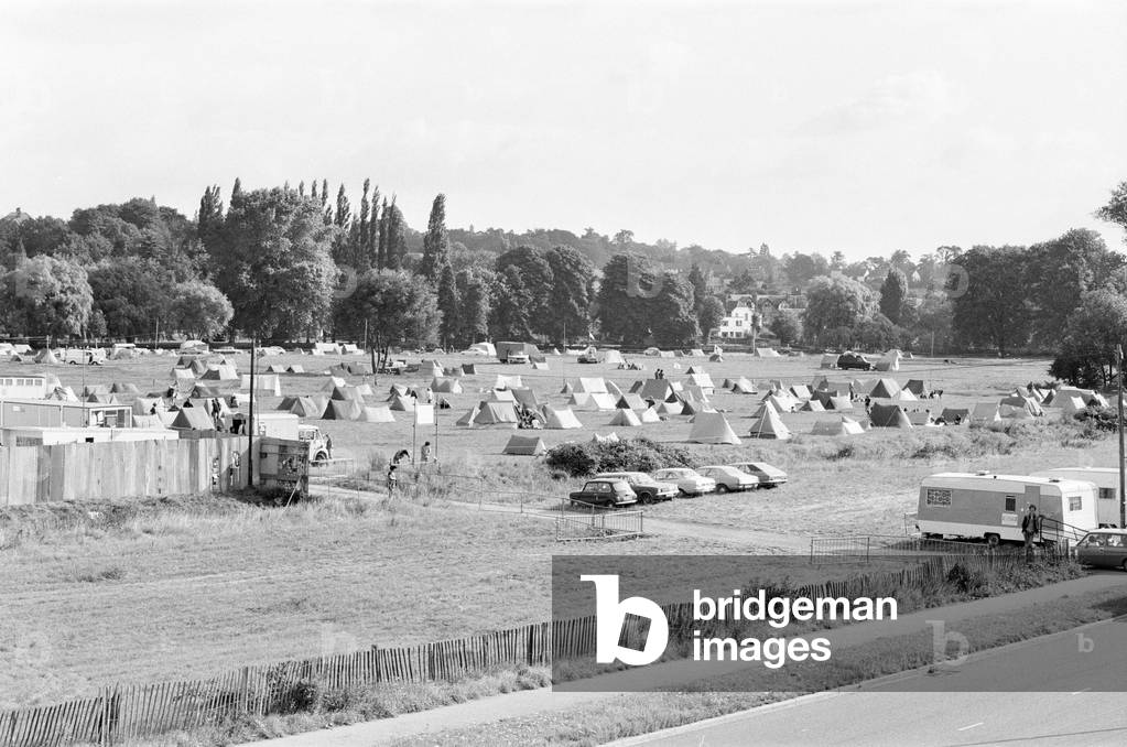 Campsite grows as festival goers start to arrive for the 20th National Rock Festival, taking place 22nd to 24th August, at Richfield Avenue, Reading, August 1980.