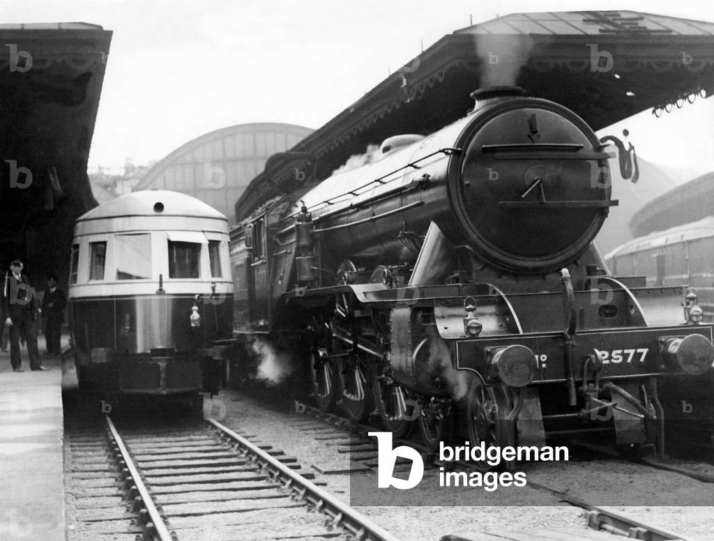 A 60 seater Diesel electric Armstrong Whitworth railbus, the first of its kind in the country, beginning a run from Newcastle Central Station on 26th September 1933 (b/w photo)