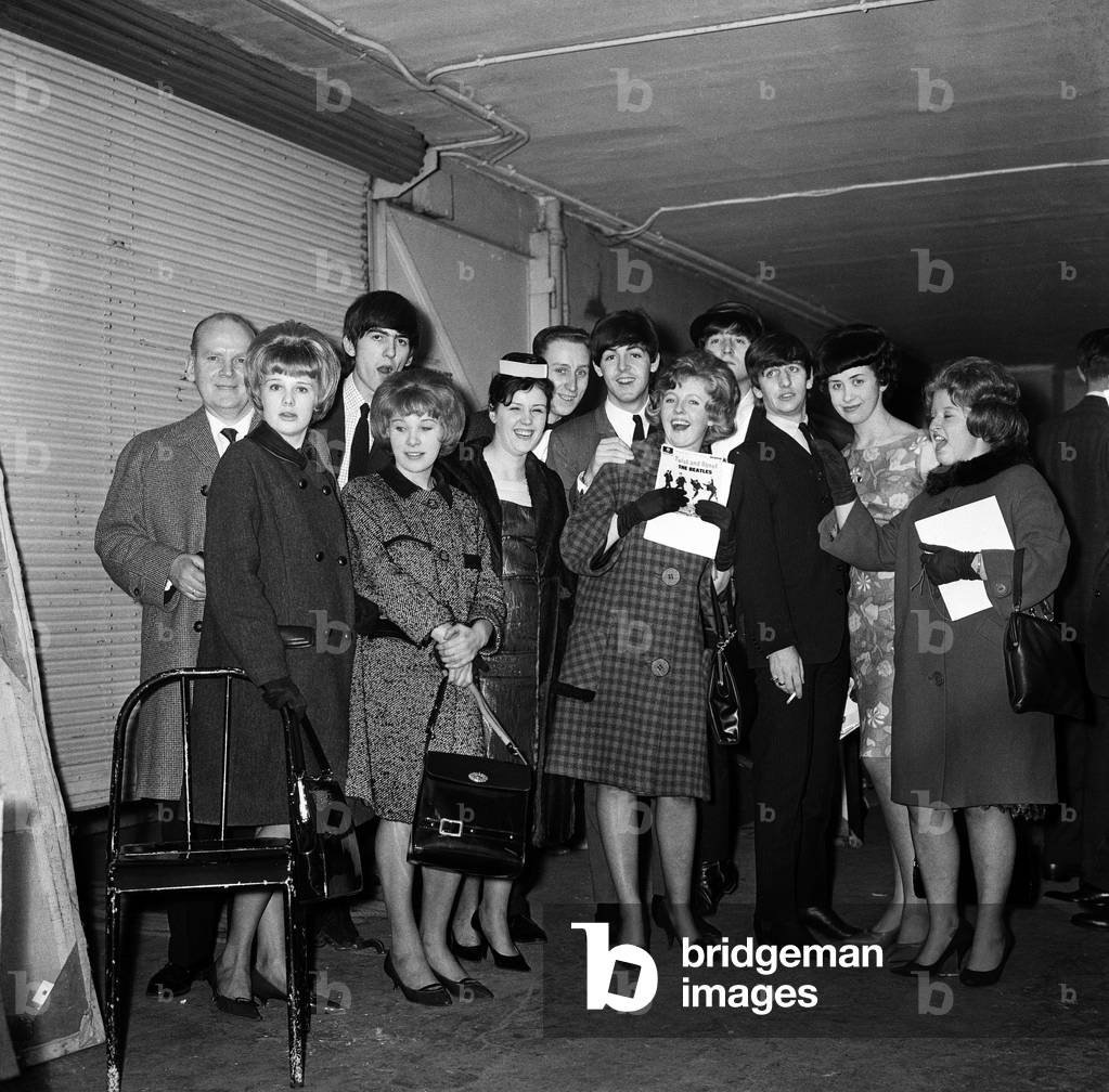 Meet The Beatles Competition Winners, run by the Sunday Mirror Newspaper, meet with The Beatles backstage at the Olympia Theatre, Paris, France, during the groups residency (16th January - 4th February), pictured Monday 3rd February 1964 (b/w photo)