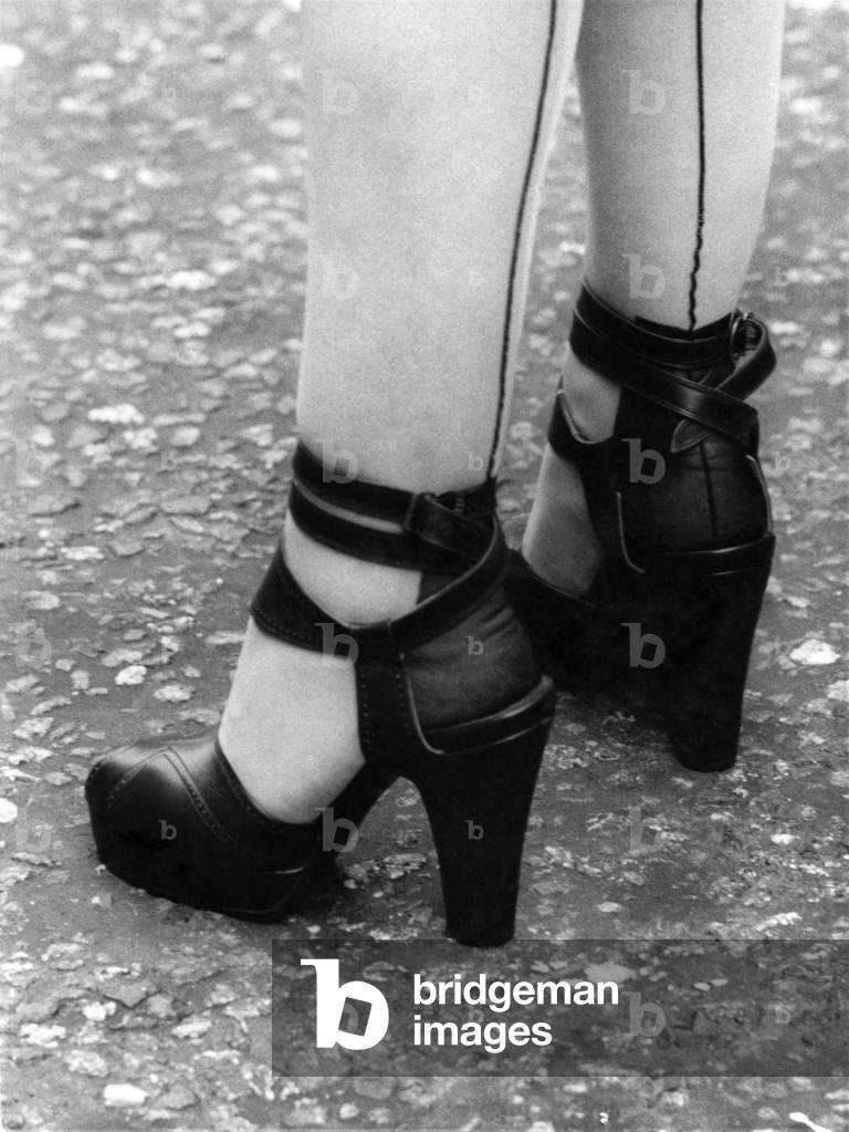 Back on show black-seamed stockings with strappy shoes, April 1968 (b/w photo)