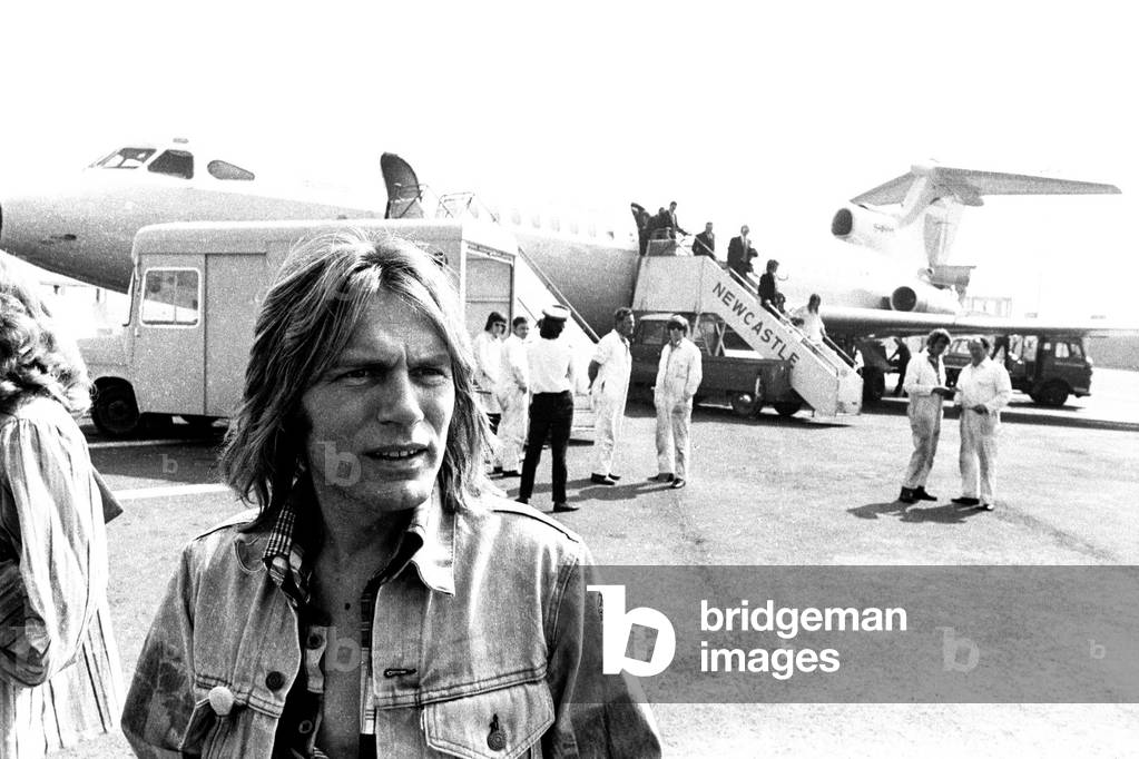 Adam Faith flew into Newcastle Airport on his way to opening a new boutique in Durham City, 21st July 1972 (b/w photo)