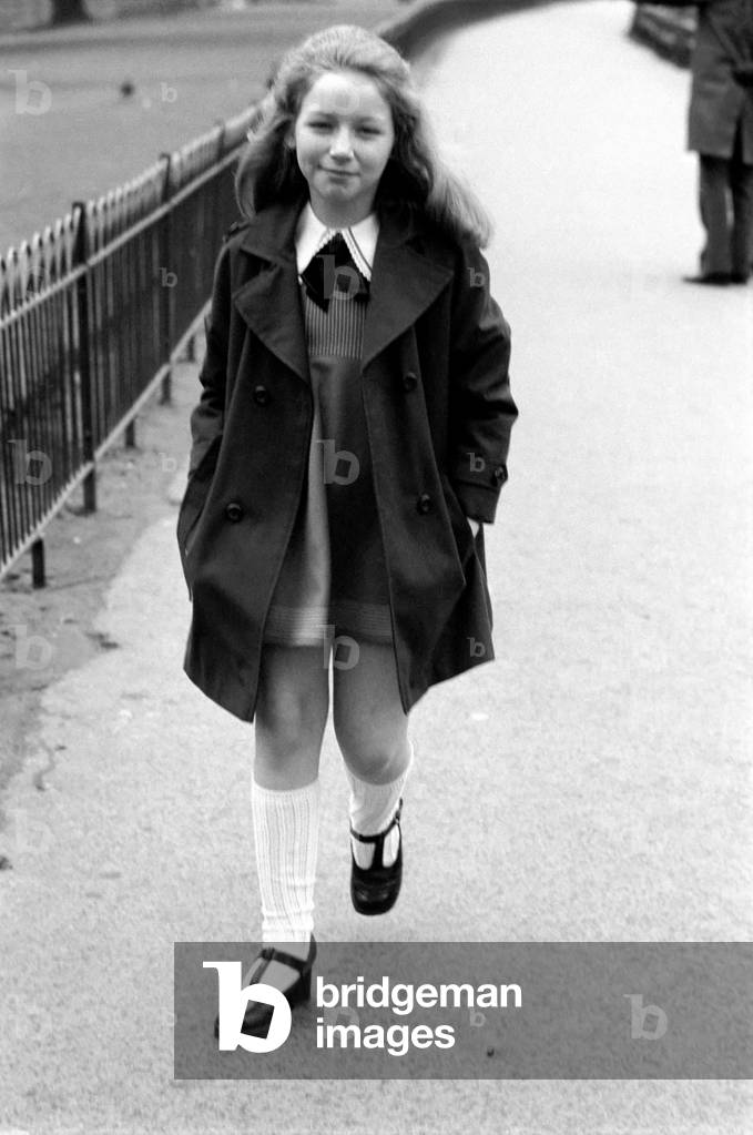 Lena Zavaroni enjoying herself in Green Park, London, 12th March 1975 (b/w photo)