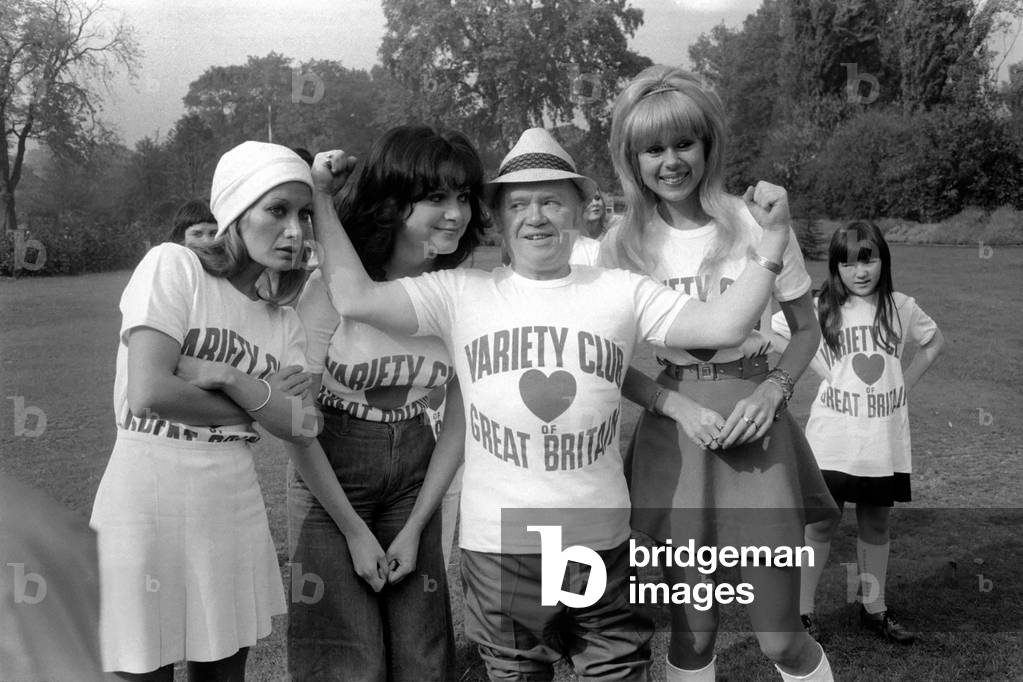 Charlie Drake and Girls. Seen here promoting the work of the Varity Club of Great Britain, October 1974 (b/w photo)