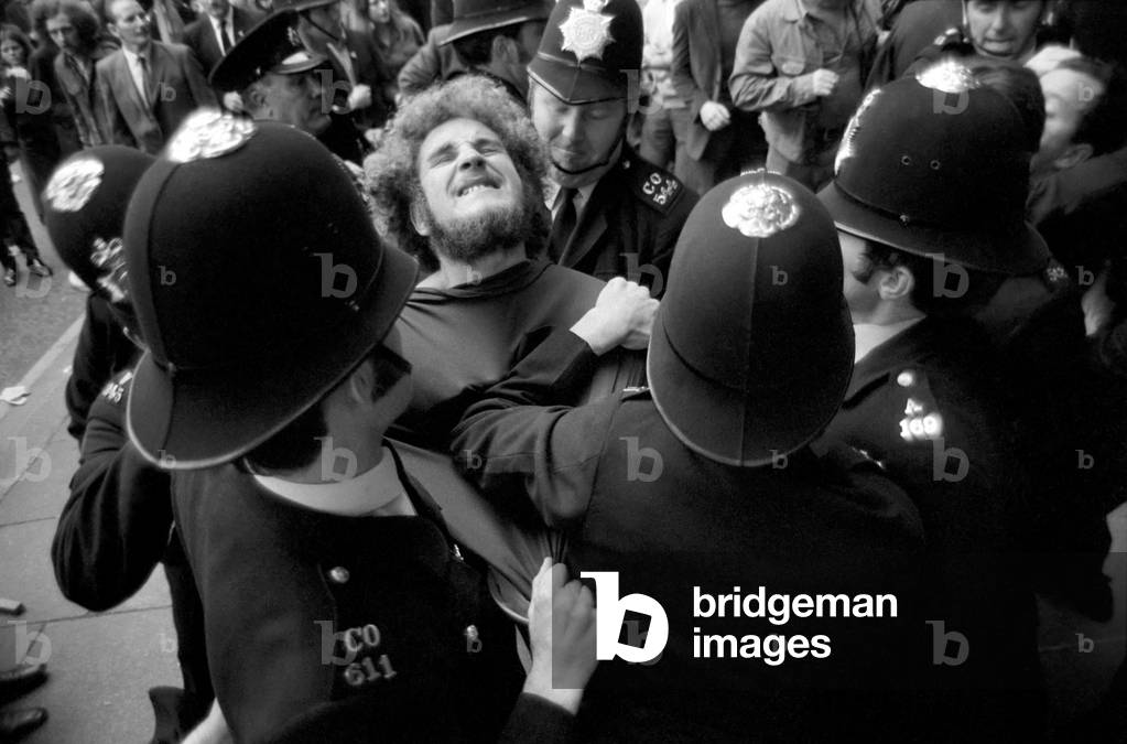 Demonstrators protesting about the situation in Northern Ireland held a meeting at Hyde Park Corner. Following the rally the protestors marched to Whitehall. Where scuffles with the police broke out, resulting in several people being arrested. August 1971 71-7537-007