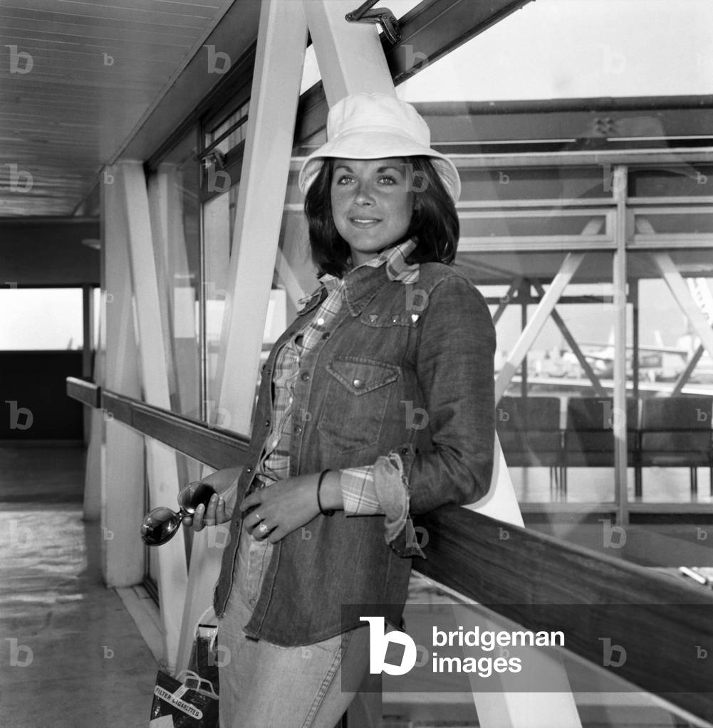 Film actress Mary Tamm pictured at Heathrow Airport, April 1975 (b/w photo)