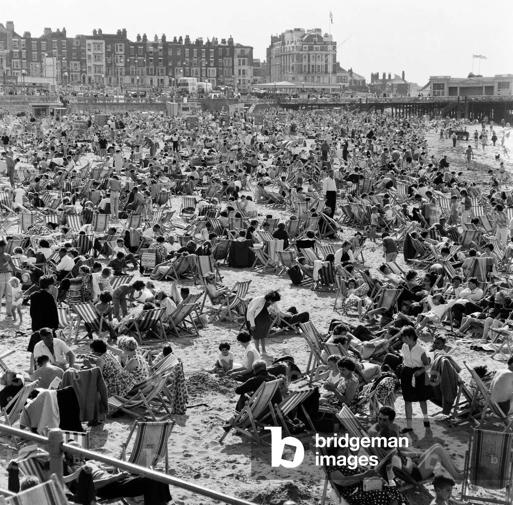 Hot weather scenes on the beach in Margate, Kent, during August Bank Holiday. 5th August 1962 (b/w photo)